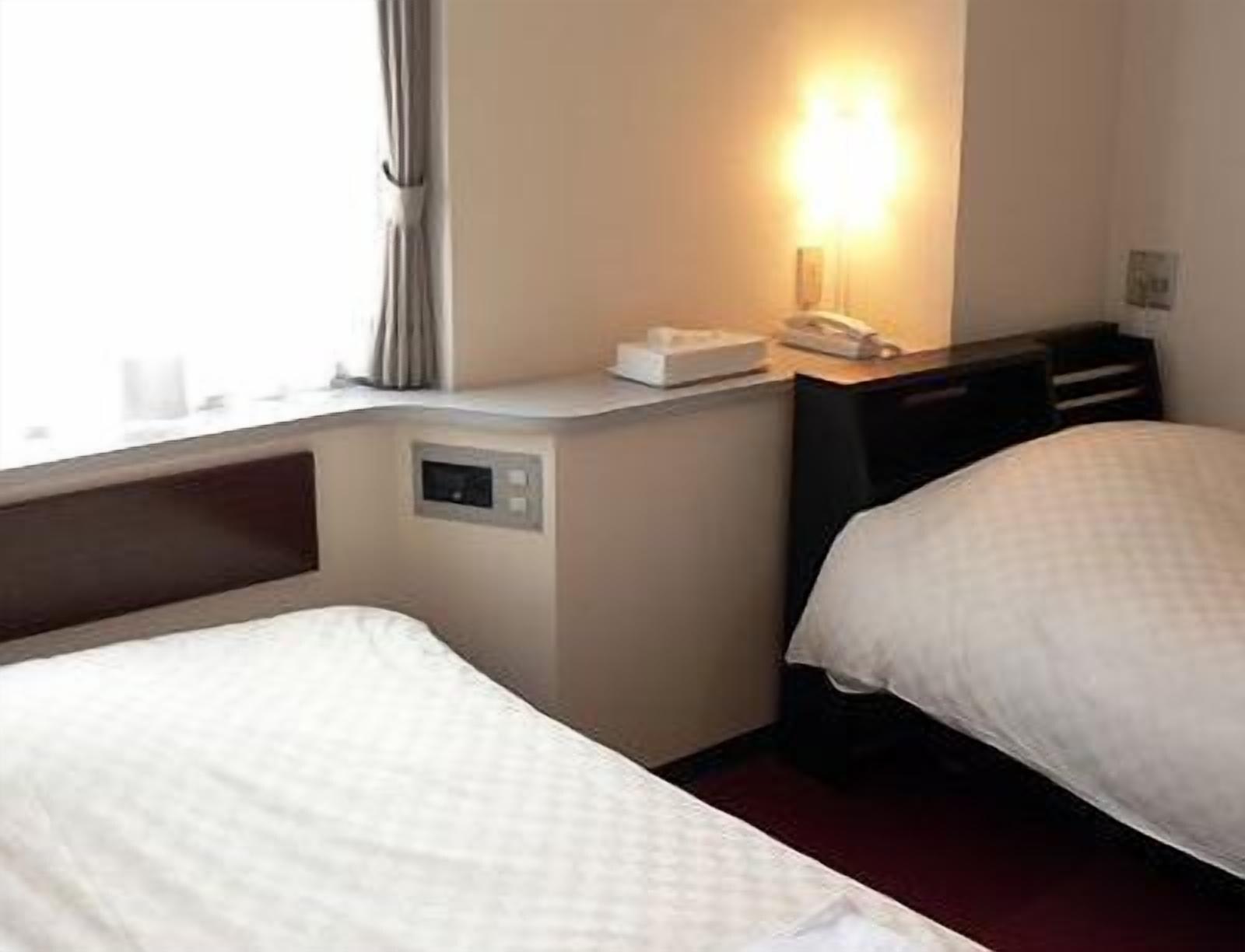 Hotel Livemax Budget Iyo Mishima Shikokuchuo Buitenkant foto